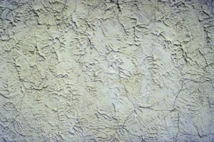how to paint interior stucco walls