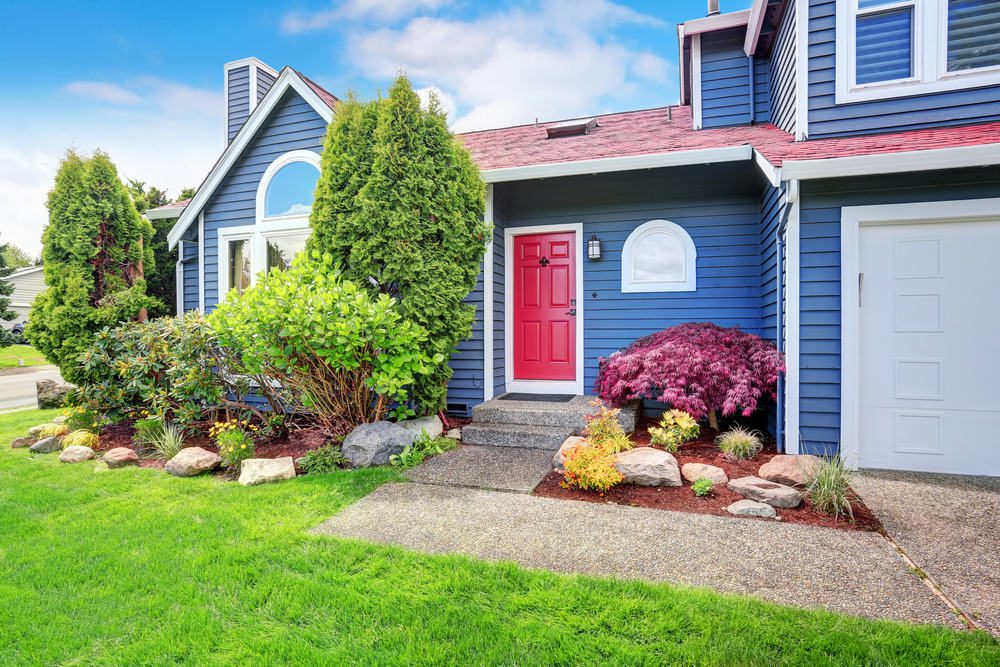 Beautiful,Curb,Appeal,With,Blue,Exterior,Paint,And,Red,Roof.
