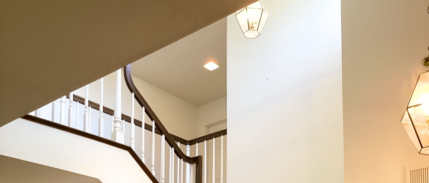 Peek Brothers Painting professional completing a residential painting project covered by a 5-9 year warranty