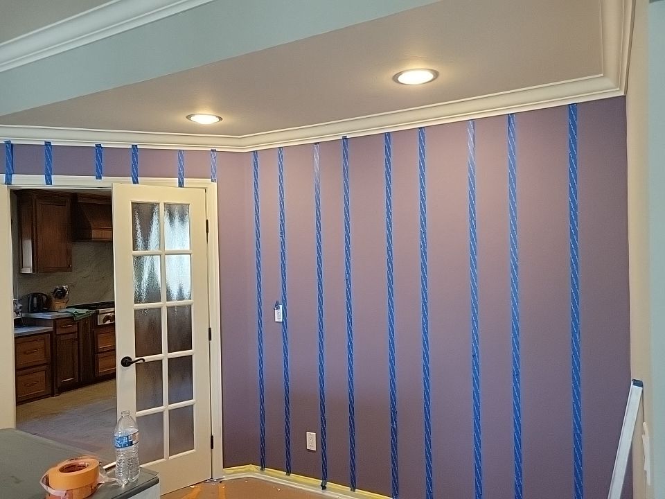 Peek Brothers Painting professional painter completing detailed preparation before a premium residential painting project